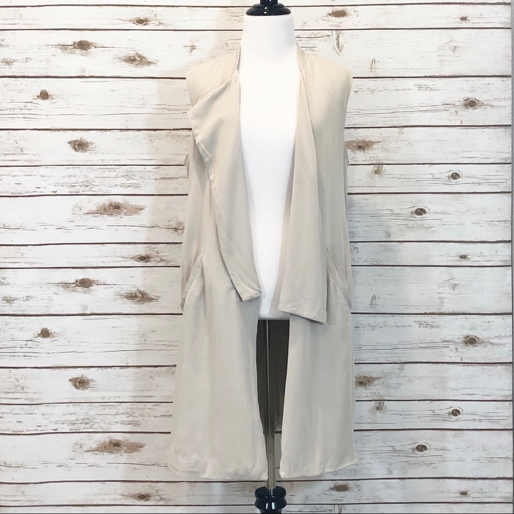 * 1. State • Open Front Long Vest